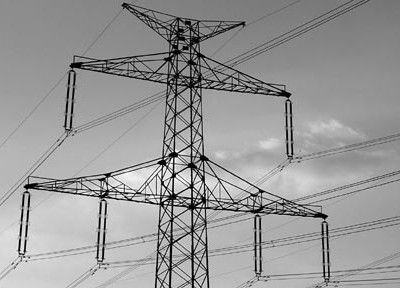 A photograph of a pylon to illustrate the microfiction “Steel Lattice in a High Voltage Place” by P Edward Cunningham, published in issue 21 of Neon