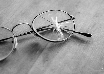 A photograph of glasses to illustrate the poem “I Knew by The Shapes of The Trees” by Emily Darrell, published in issue 22 of Neon