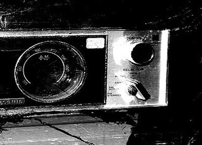 A photograph of a radio to illustrate the poem “Fire Flowers” by Jonathan Greenhause, published in issue 20 of Neon