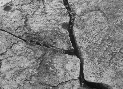 A photograph of a crack to illustrate the poem “Apocalypse Love Song” by Jason Irwin, published in issue 21 of Neon