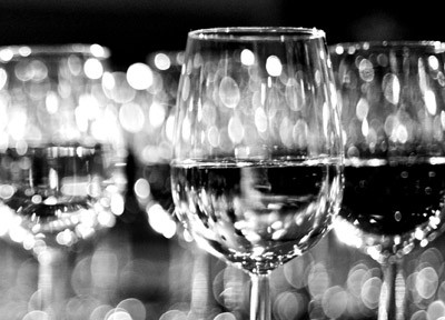 A photograph of wine glasses to illustrate the flash fiction "Ticking Clock" by Kirby Wright, published in issue 28 of Neon