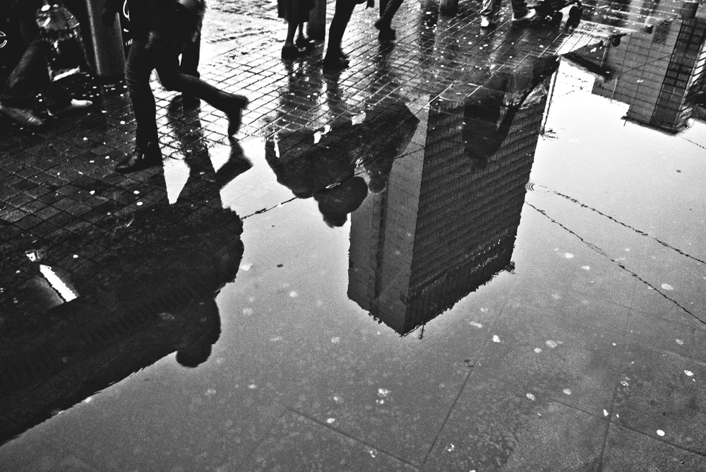 A photograph of a puddle to illustrate the flash fiction "Seek" by JR Fenn, published in issue 30 of Neon