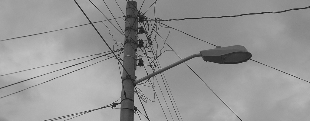 A telephone pole to illustrate the poem "Dead Drop" by Jon Kemsley Clark, published in issue 45 of Neon
