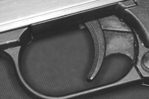 A photograph of a gun to illustrate the poem "Playing With Guns" by Shanalee Smith, published in issue 37 of Neon