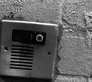 A photograph of an intercom to illustrate the short story "Best of Drive-Thru" by Mack Gelber, published in issue 40 of Neon